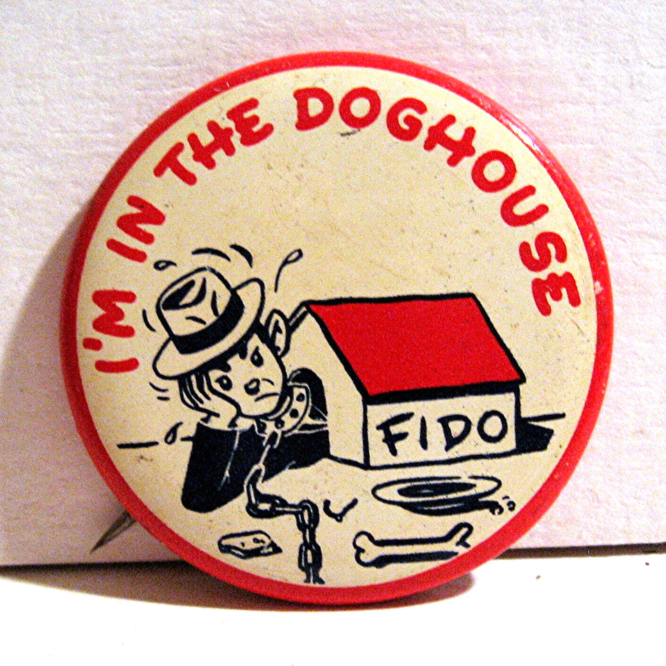 1940s–50s old-stock 'I'm In The Doghouse' pinback button — tiny, cheap, and dripping with mid-century married-man humor.