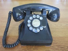 Bell System Western Electric black rotary phone Model 302