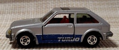 Tomica 4-4 Mazda Familia 1500XG Made in Japan Damals No box