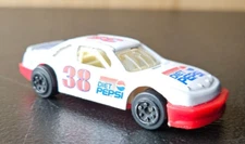 DIET PEPSI RACE CAR. 1993 PETER COMLIA #38. DIECAST CAR