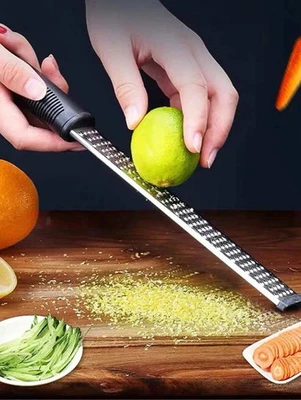 Hand Held Cheese Grater with Stainless Steel Handle Ginger Lemon Zester Slicer..