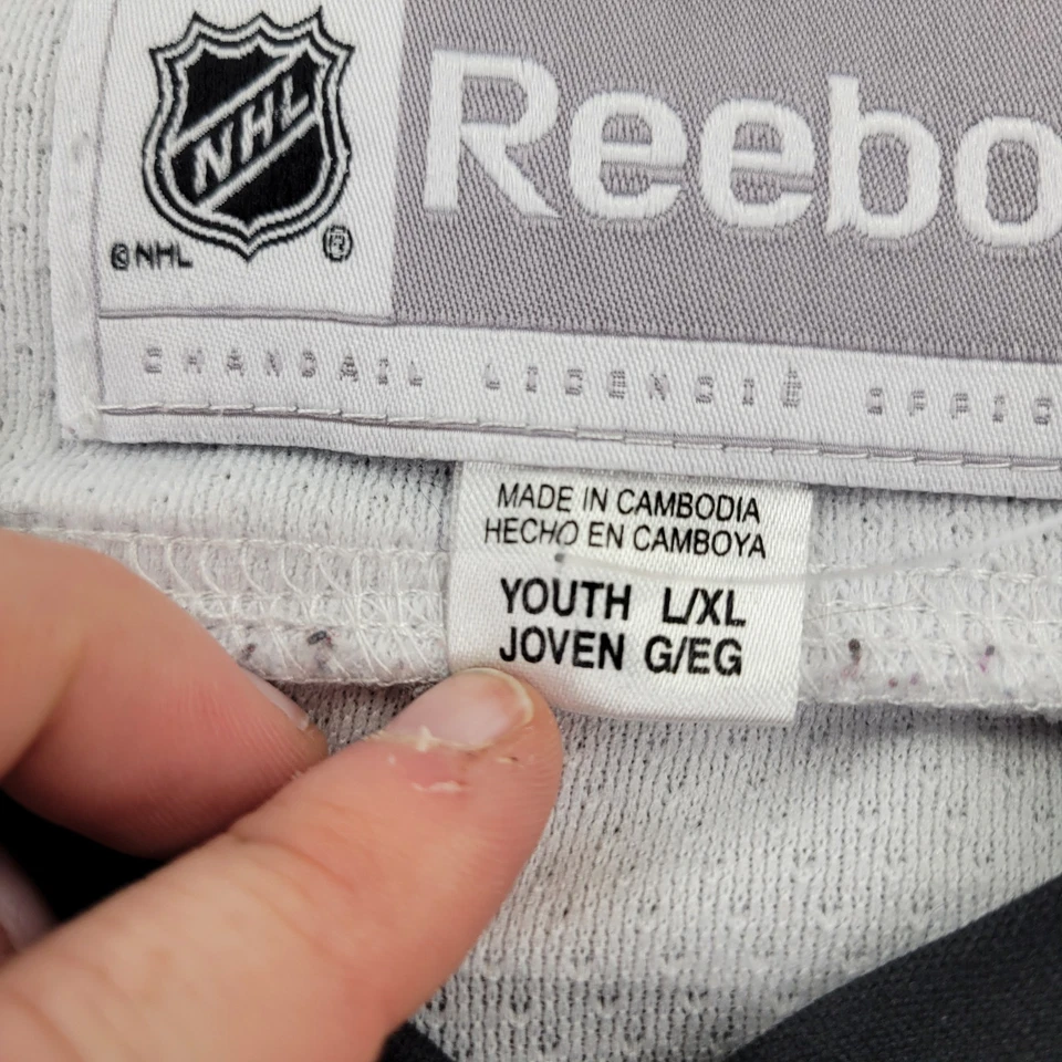 Camiseta deportiva de los Chicago Blackhawks 19 punteras para niños grande/XL Reebok con cuello en V para jóvenes Foto 4 de 4