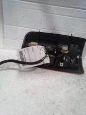 2003 Chevrolet Tahoe Left Tail Light Assembly Gold 597071 189k Miles Used