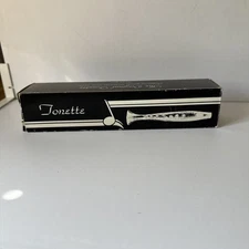 vintage musical black Tonette flute  By Gibson recorder in the original box