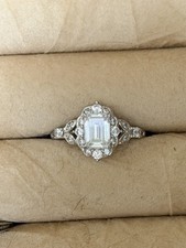 Halo Art Deco Emerald Cut CZ Ring in Sterling Silver