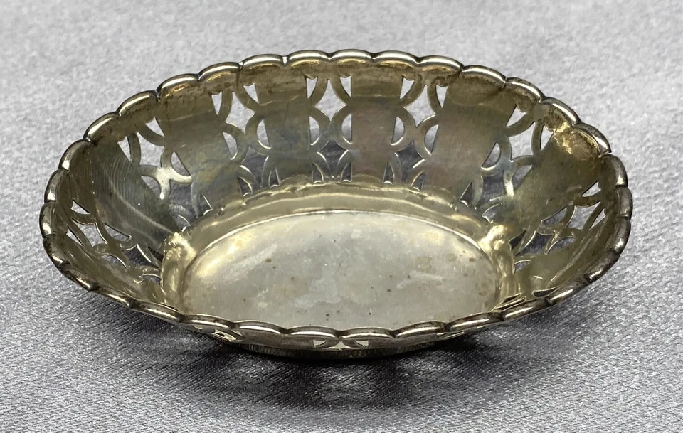 BOTAS ANTIGUAS PURE DRUG CO PLATA ESTERLINA BIRMINGHAM INGLATERRA PLATO DE NUECES PERFORADAS Foto 2 de 4