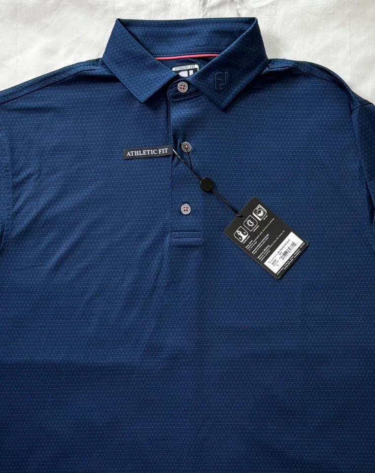 Camisa polo de golf Footjoy para hombre estampado triángulo azul marino parche en el brazo talla M Foto 3 de 4