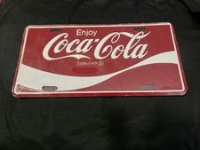 NOS VINTAGE ENJOY COCA COLA  RED WHITE EMBOSSED METAL LICENSE PLATE 12