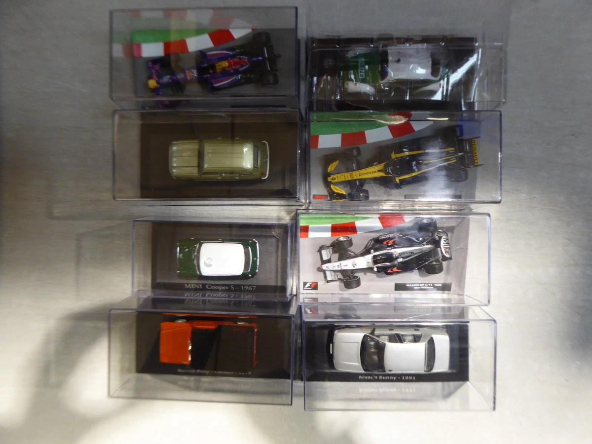 Un lot de 4 voitures miniatures pour circuit routiers Jouef au 1/43e