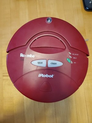 iRobot Roomba Red 4100 w/charger. For parts or repair (Worked intermittently.)