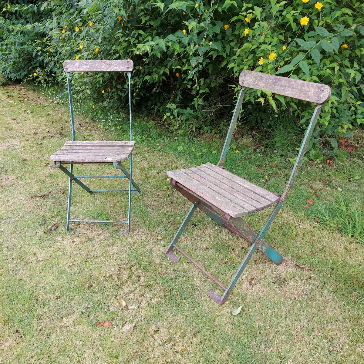 Pair of his and hers Antique Folding Garden Chairs