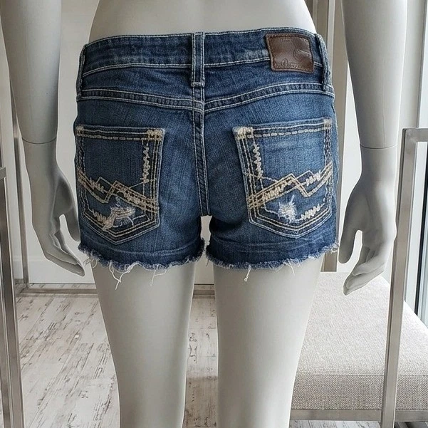 BKE Stella Distressed Denim Shorts Medium Wash Low Rise Size 23 BWX3108