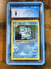 1999 Pokémon Base Set 2/102 Holo Blastoise CGC 8 w/ Graded Guard