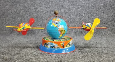 Vtg Tin Litho Windup Airplane Spinning Around Globe Made in W. Germany Works