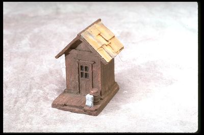 SMC-203 Small Shed with Porch  HO-Scale   (unfinished)
