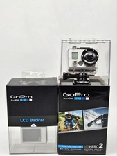 2 GoPro HD HERO2 Outdoor Edition e LCD BacPac scatola aperta Be A Hero fotocamera sport