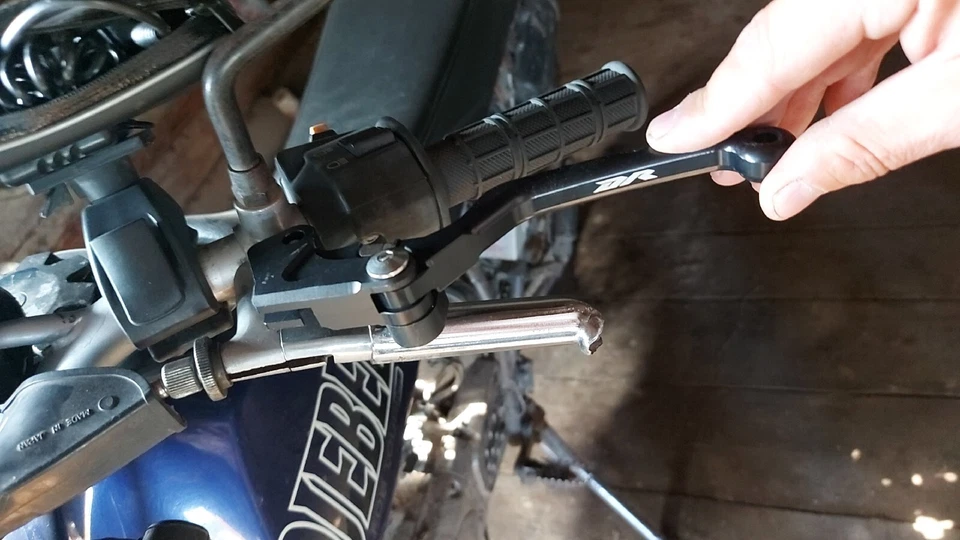 Palancas de embrague de freno pivote CNC para Suzuki DR350/SE/S DR350 DR250SE DR200/SE DR125 Foto 3 de 4