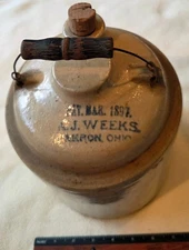 Jug with Unusual Top by A. J. Weeks in Akron, Ohio patented March, 1897