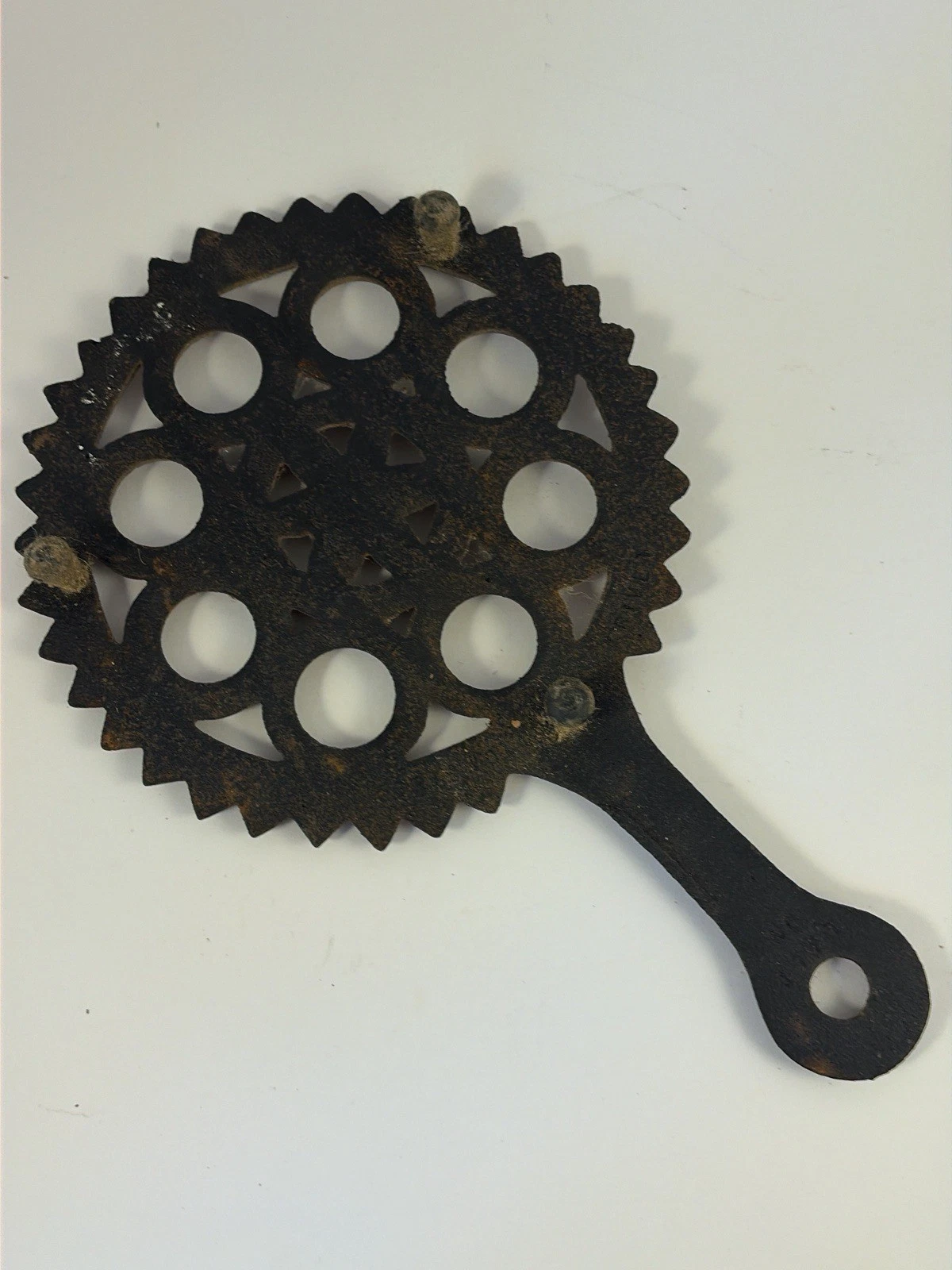 Griswold Unmarked Cast Iron Circle & Star Trivet Black w/ Handle - product detail image 3