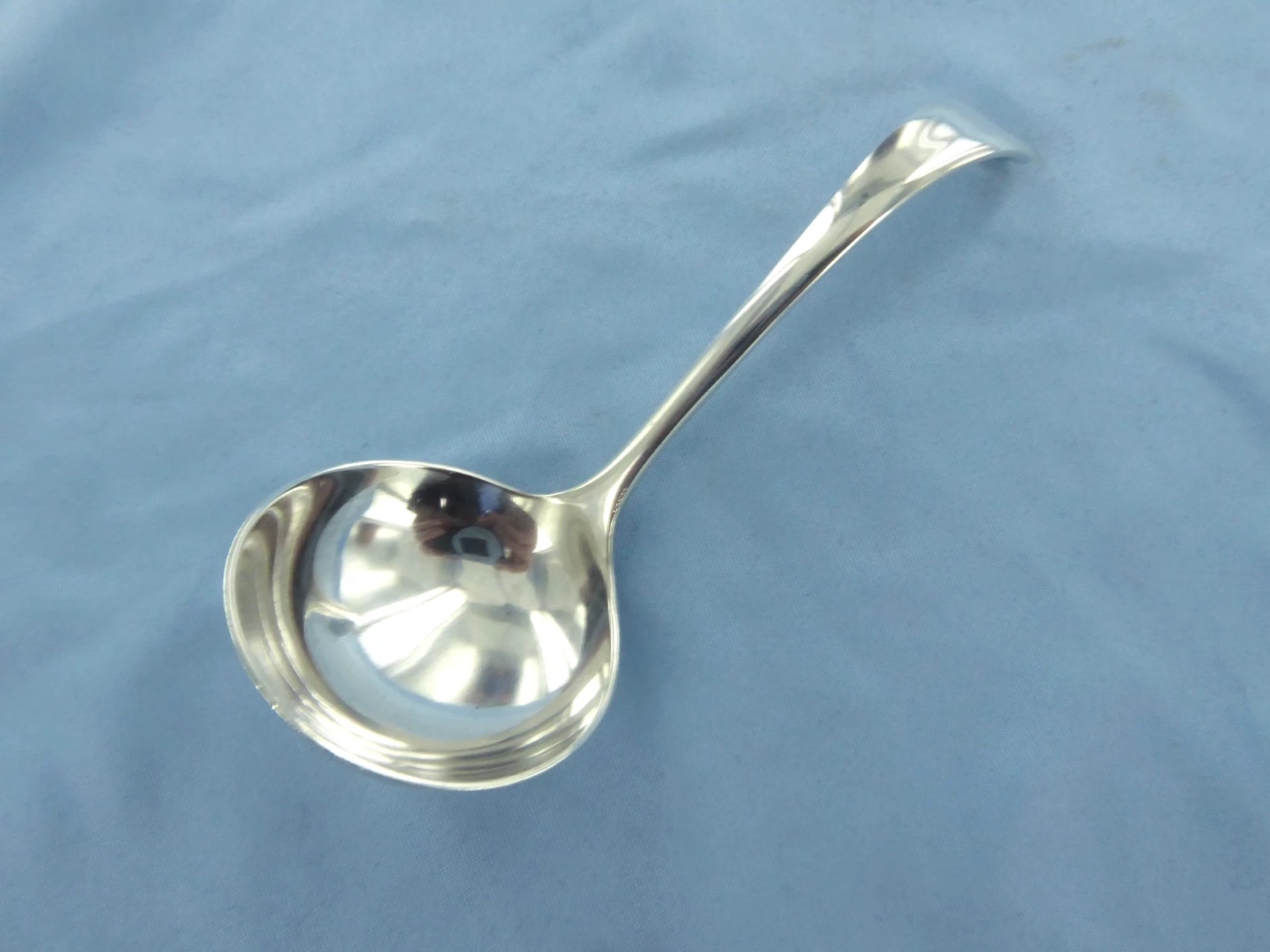 A VINTAGE STERLING SILVER OLD ENGLISH, SAUCE LADLE.SHEFFIELD 1977..
Opens in a new window or tab