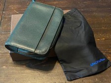 Louis Vuitton TAIGA BAIKAL Clutch Bag in Green 24 PHOTOS