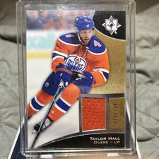 2015-16 Upper Deck Ultimate Collection - Taylor Hall #2 /199 (MEM)