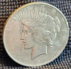 1927 D Peace Silver Dollar- Fineness .90- About Uncirculated Condition