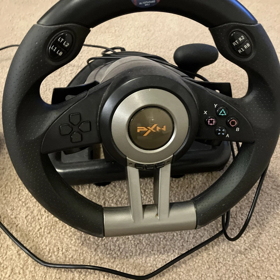 Pedales de rueda para juegos de carreras de PC PXN V9. Funciona muy buen estado Foto 2 de 4