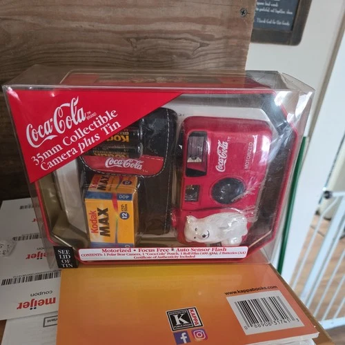 Coca-Cola Vintage Collectible 35mm Camera With Case, Film, Tin. Never Opened