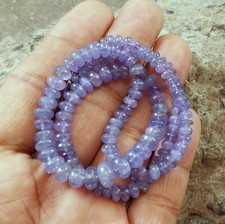 140 Carat 4.5 to 9 MM Natural Light Blue Color Smooth Tanzanite 17 Inch Beads