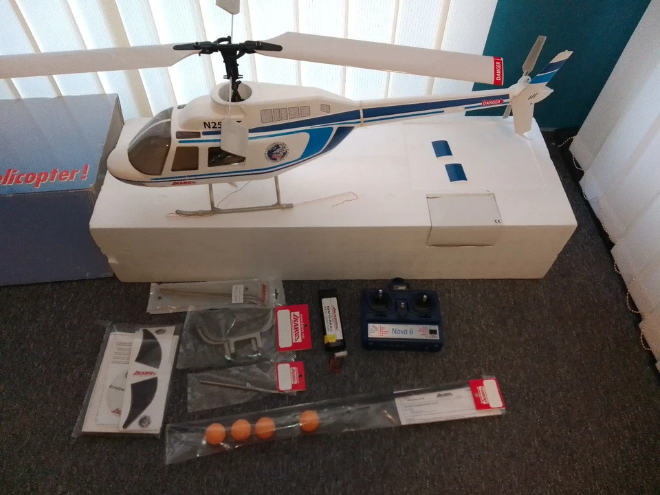 1 Ikarus ECO7 Bell Hubschrauber Helikopter + Ersatzteile Original Karton - Bild 2 von 4