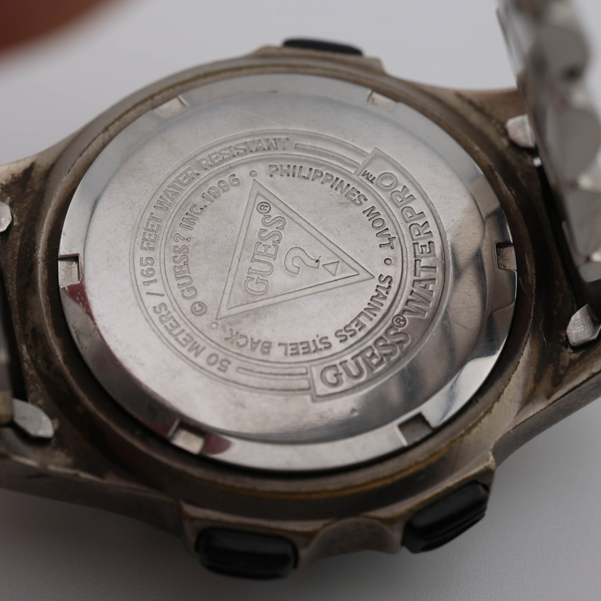 GUESS
INDIGLO CHRONO
HONG KONG
PHILIPPINES MOVEMENT Vintage Guess Indiglo Watch 1995 Gold & Silver Tone Brown  main image 4