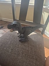 Robo Alive 10" Attacking T-Rex Dinosaur Battery-Powered Robotic Toy by Zuru Inc