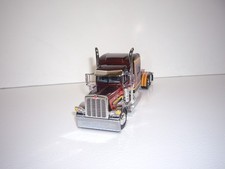 Dcp First Gear 1/64 Brown W/t Yellow, Orange Stripes Pete 389 W/t 70