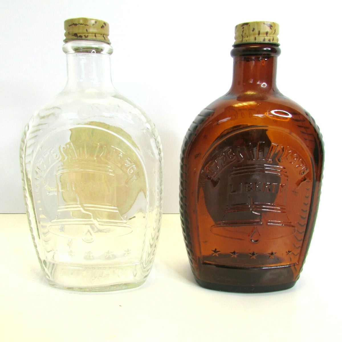 2 Vintage Log Cabin Syrup Glass Bottles Clear + Amber + Lids