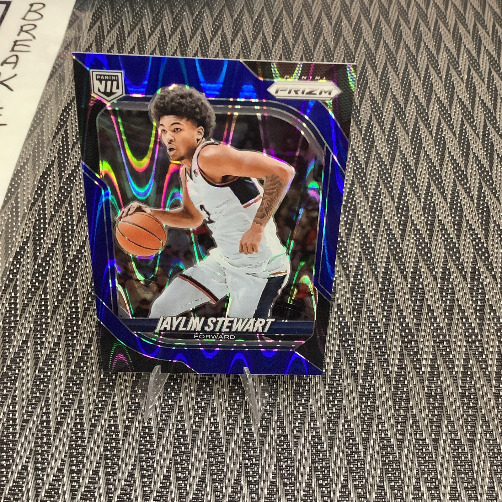 2025-26 Prizm Basketball Jaylin Stewart NIL Blue Ray Wave Prizm /199 SP UConn