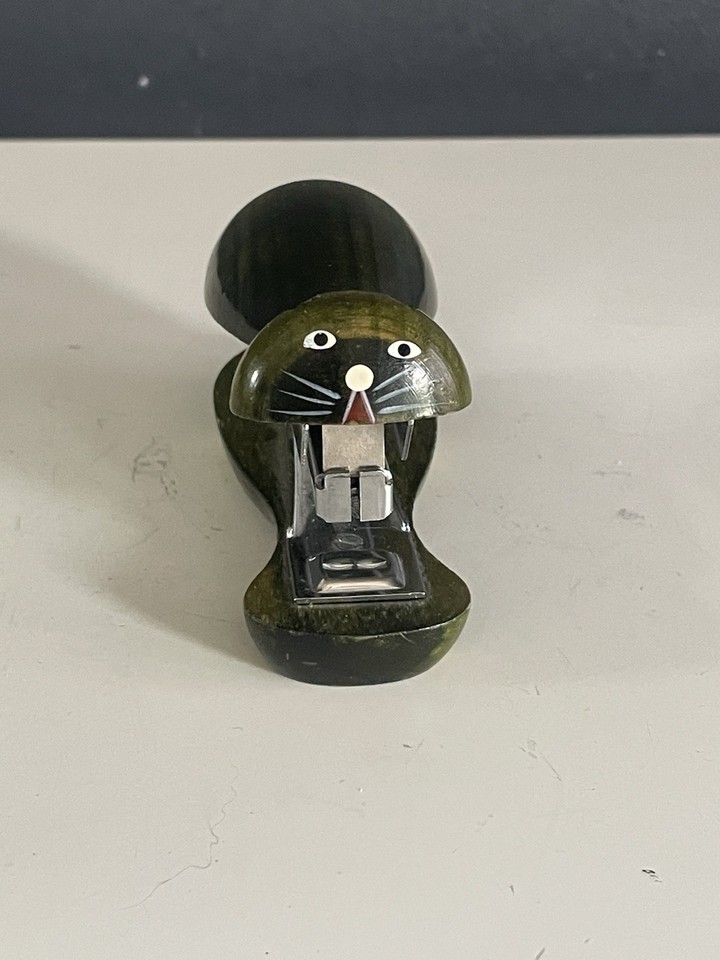 A wooden sea lion stapler from Japan is peak mid-century novelty engineering — it's a functioning office tool that looks like folk art.