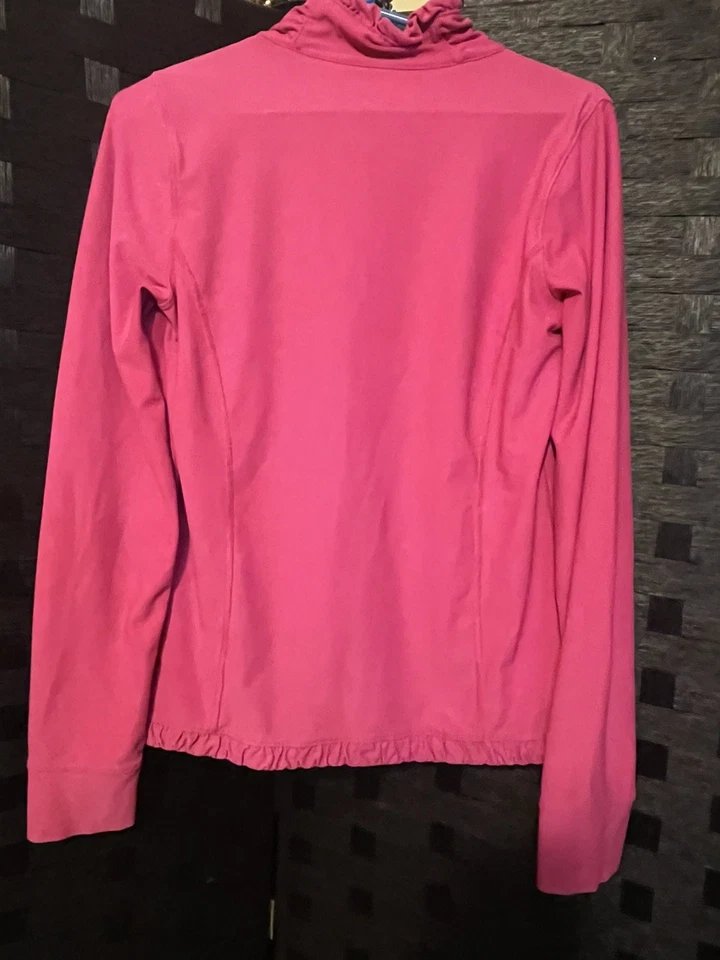Chaqueta Xersion Performance Wear para mujer con cremallera talla mediana rosa con volantes Foto 3 de 4