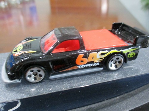 HOT WHEELS PIKES PEAK TOYOTA TACOMA #64 YELLOW FLAMES BLACK TRUCK 1999 M.I. - Picture 3 of 9