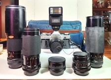 Canon AE-1 35mm SLR Film Camera w/ Case 5 Lens, flash  manuals PLEASE READ