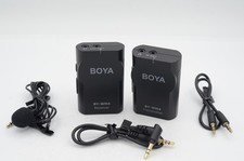 s BOYA BY-WM4 transmitter,receiver, lapel mic, and 2x 3.5mm cords