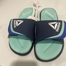￼ Reebok, Women s Delta Flow Side Sandals �...