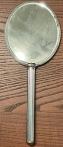 Vintage Metal Collectible Hand Mirror with Decorative Back and Metal Handle