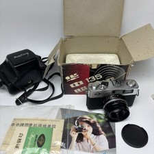 China Huazhong    PTJ-IW 1W 40mm F2.0 135 film Camera with case and box