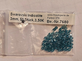 77 Swarovski Doppelkegel 3 mm Indicolite der Fa. Traumperle