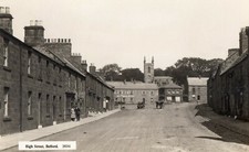 BELFORD, NORTHUMBERLAND. HIGH STREET. REAL PHOTO POSTCARD