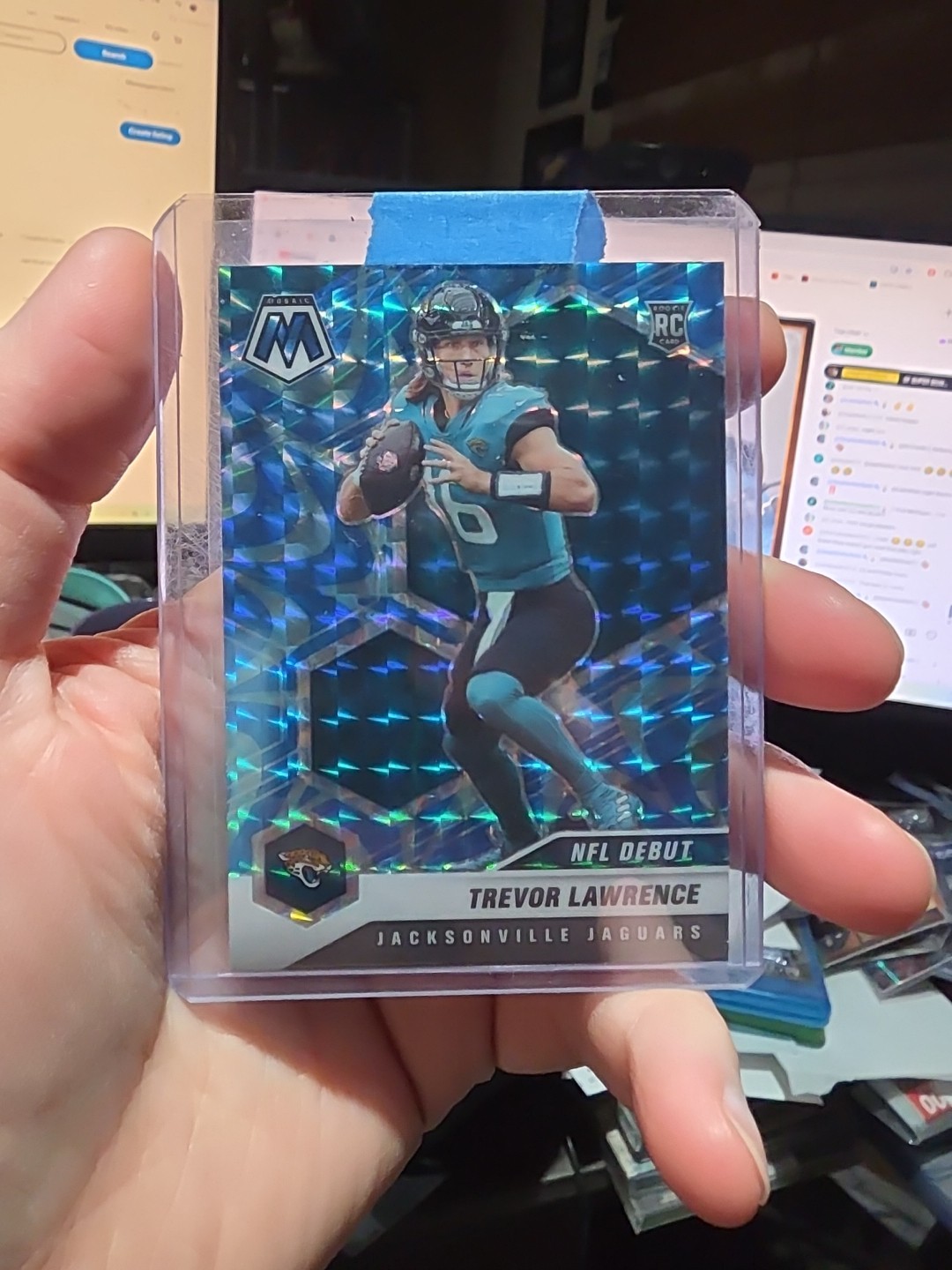 2021 Panini Mosaic - NFL Debut Trevor Lawrence #241 Reactive Blue Mosaic