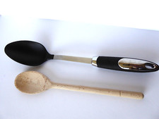 Marks and Spencer stainless steel and plastic cooking spoon, plus wooden spoon
