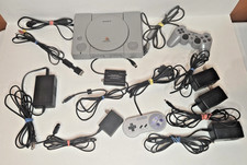 Random Video Game Lot: PS1 Console, SNES Controller, Gamecube Cord, and more