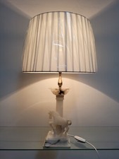 Lampada con base in pietra bianca(cavallo) componenti in ottone paralume tessuto